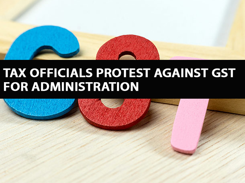 tax-officials-protest-against-gst-for-administration